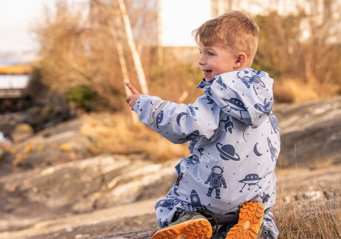Vad är skillnaden mellan regnkläder & skalkläder?