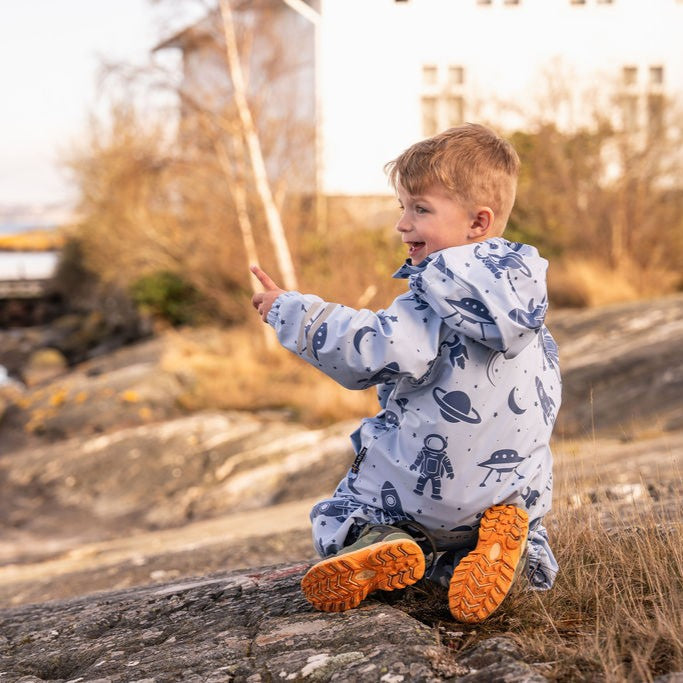 Vad är skillnaden mellan regnkläder & skalkläder?