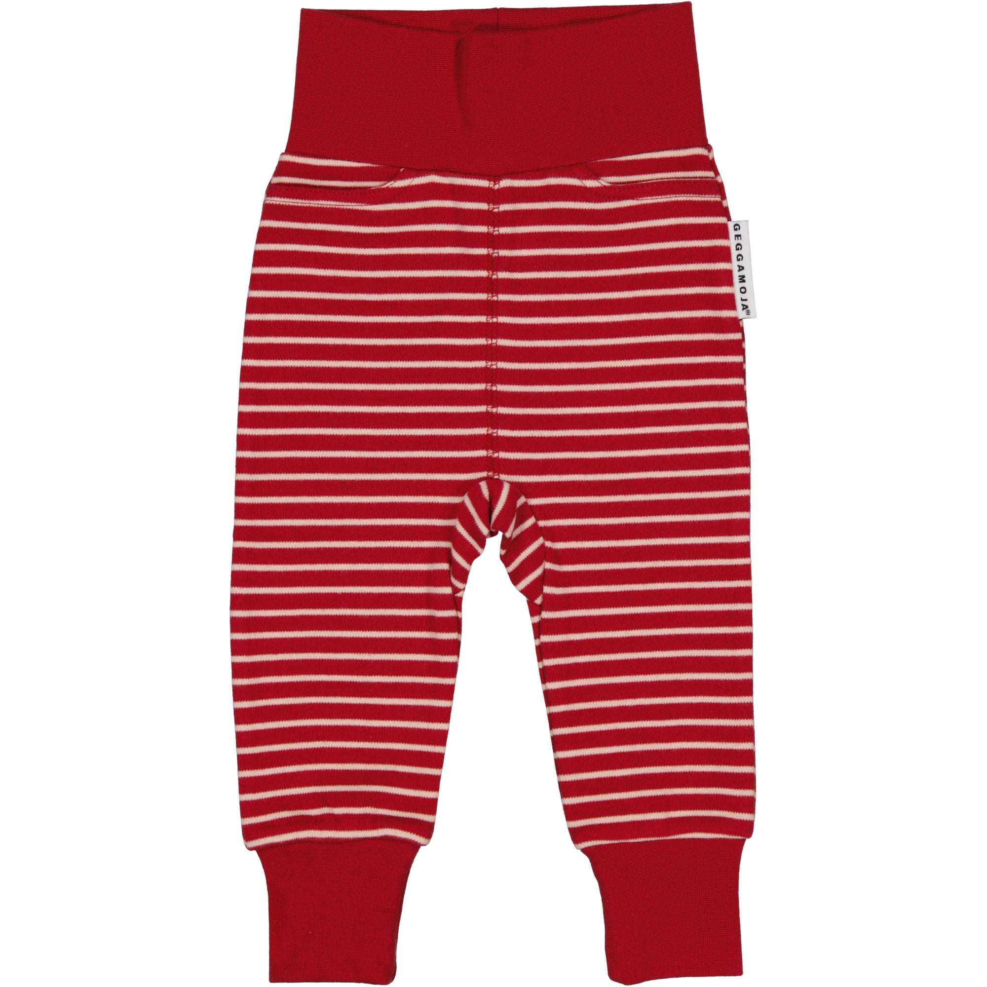 Pink and red striped organic cotton baby trousers with wide cuffs viewed from the front by Geggamoja.