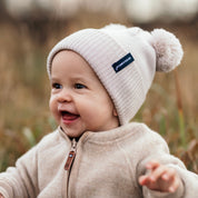 Stickad Mössa Tofsar Beige